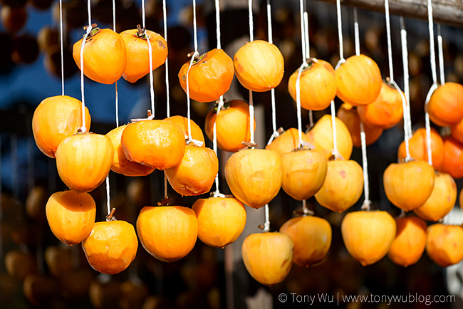 persimmons hanging to air dry, japan