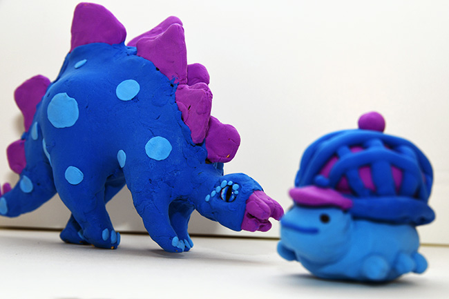 Stegosaurus and turtle by Sophie