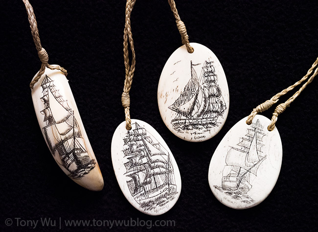 modern scrimshaw on sperm whale teeth