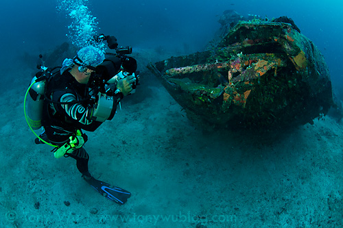 Julian taking a photo of the Black Jack B-17 wreck